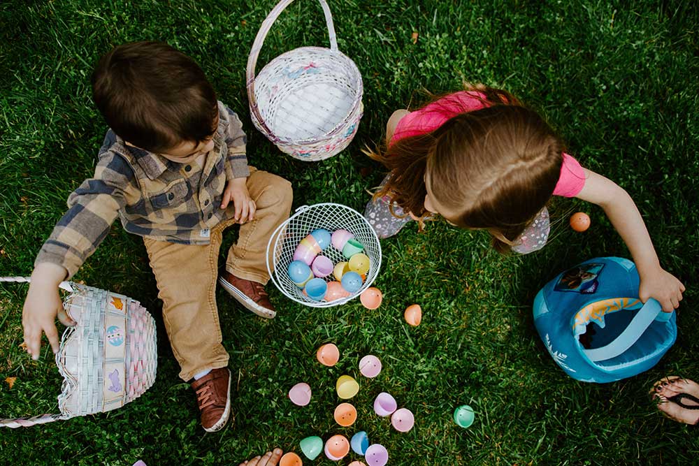Children with Easter baskets on grass